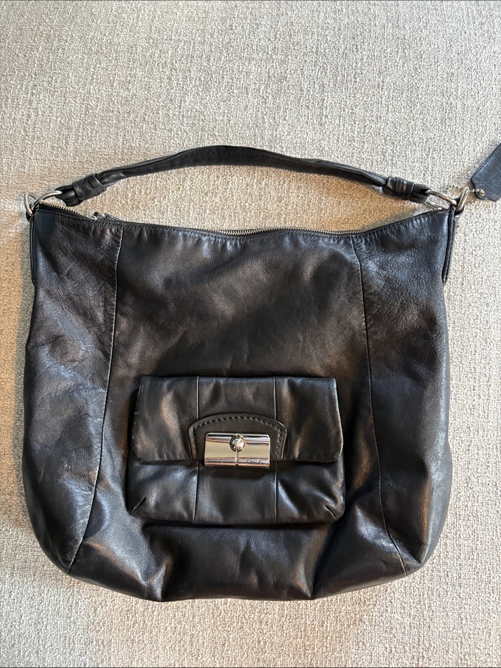 Coach Black Leather Shoulder Bag with Front Pocket and Silver-Tone Closure
